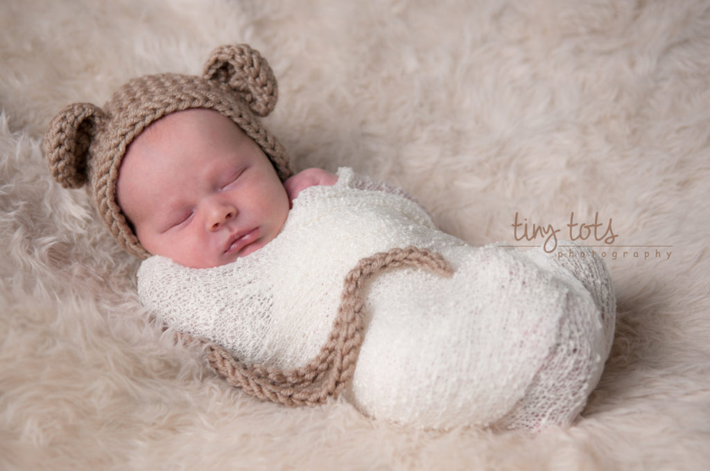 Baby boy with bear hat