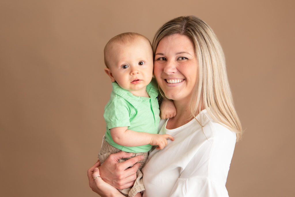 mom and one year old baby boy portrait during studio photography session